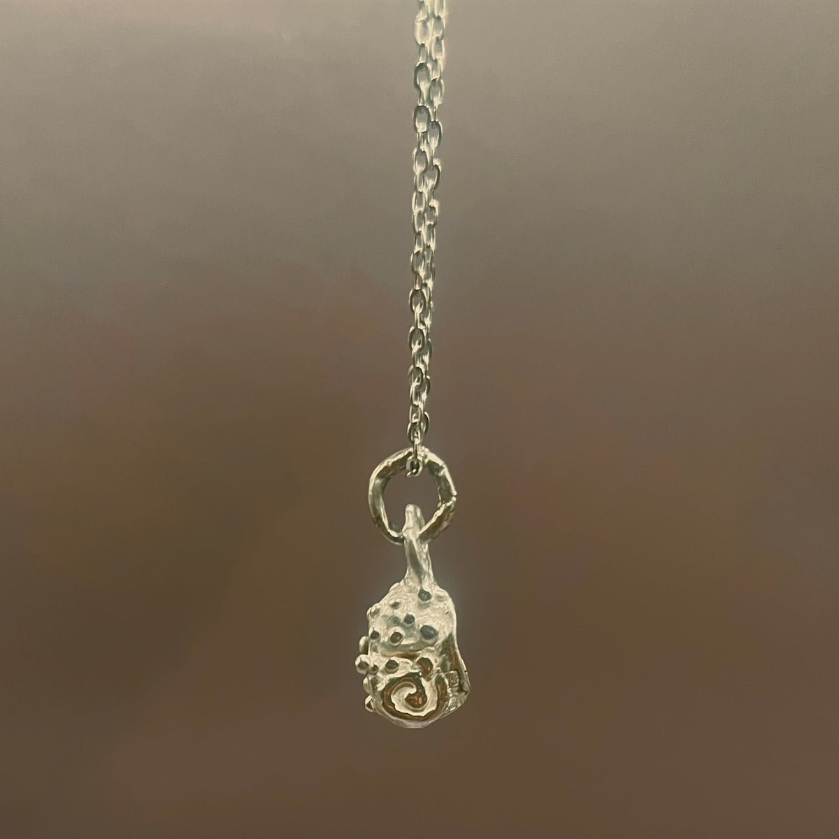 Motherland Conch Shell Charm